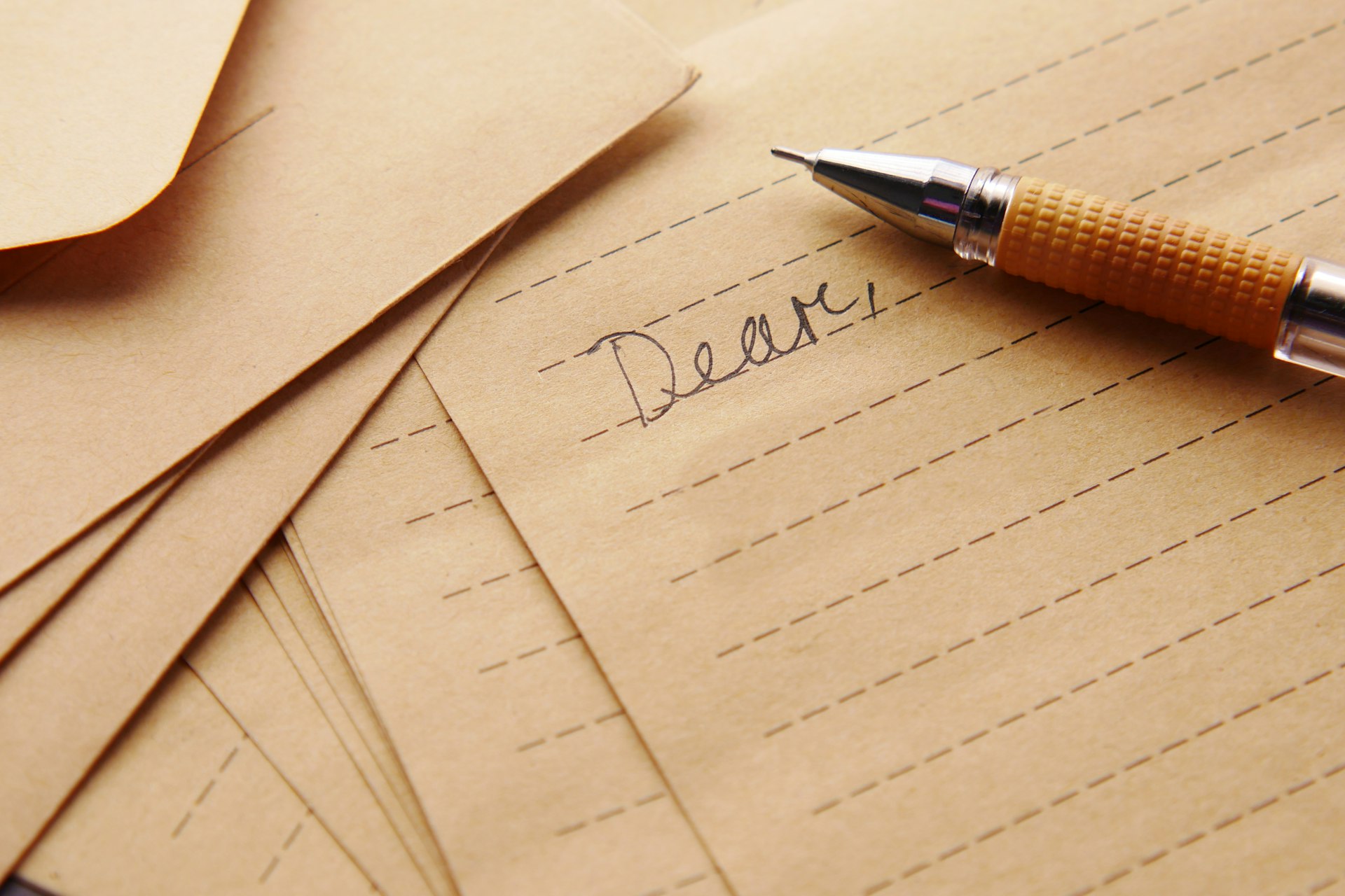 Handwritten letter in soft window light