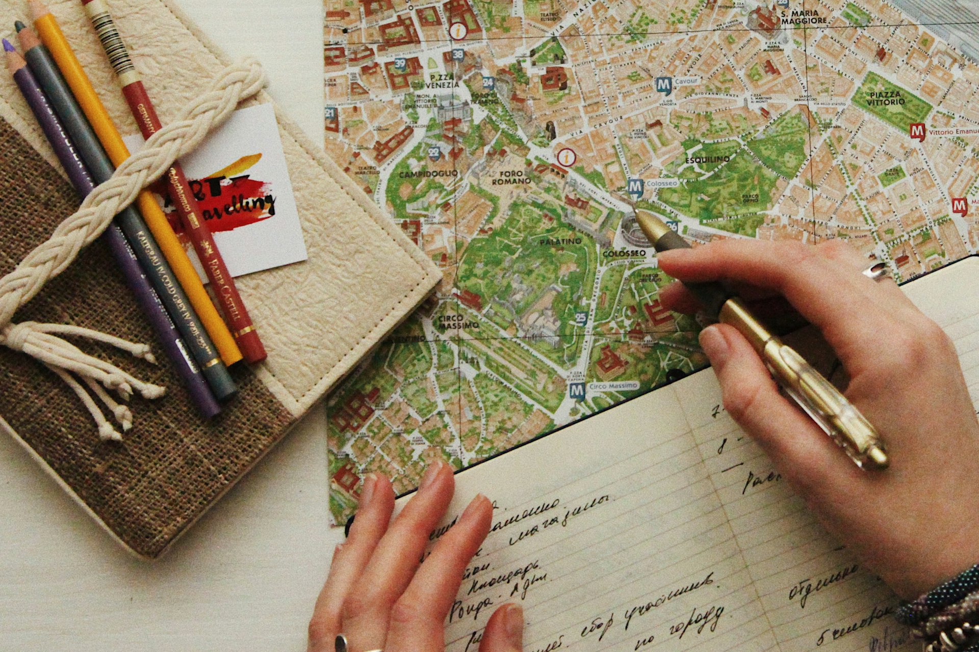 Notebook and map used for planning a pre-wedding trip to Japan